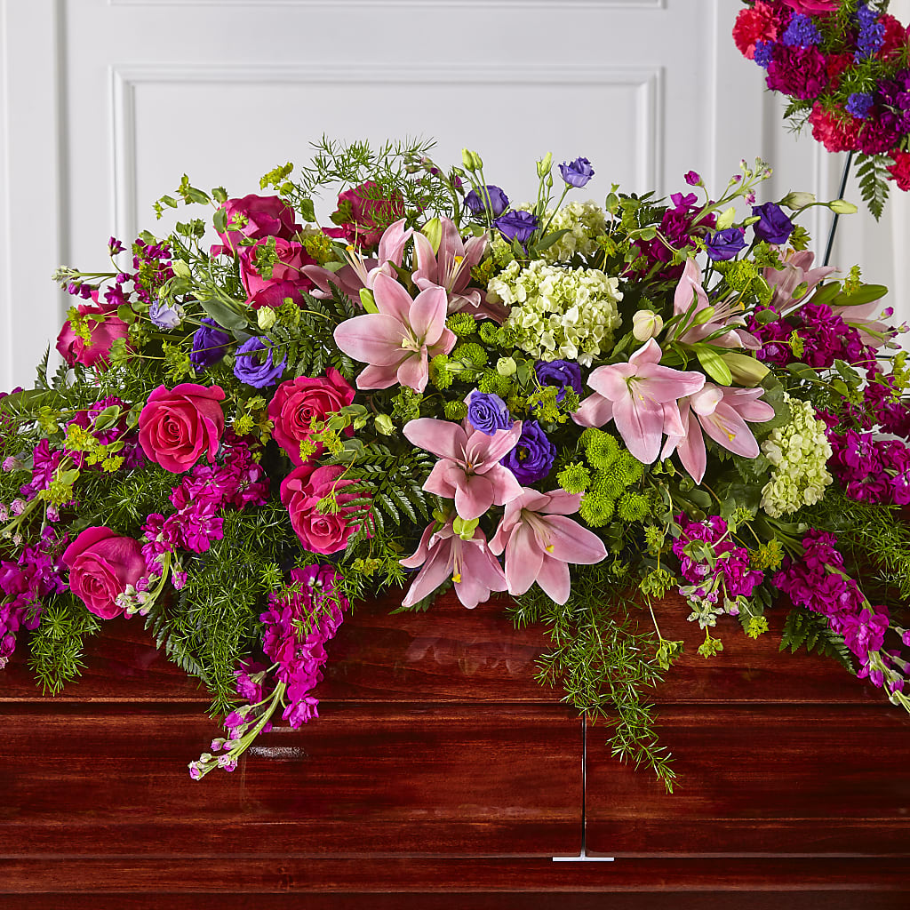 Radiant Tribute Casket Spray – Village Flower Shop, Kelowna BC